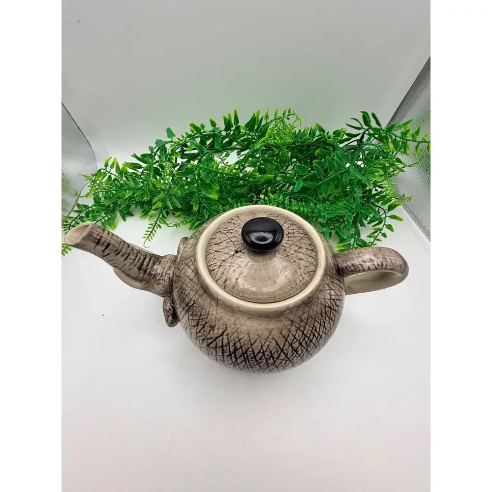Vintage world market elephant tea pot.
